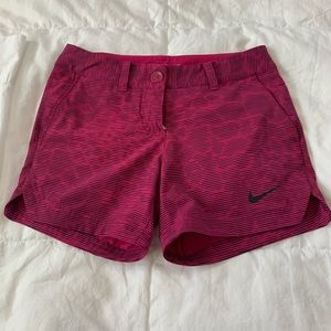 Woman’s Pink Nike golf shirts